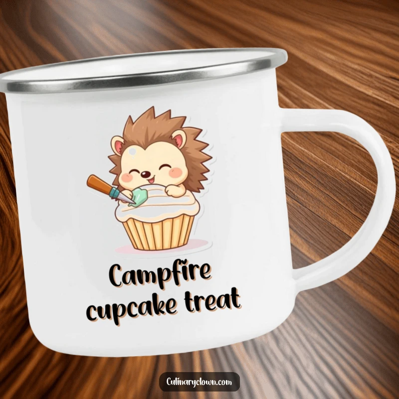 Funny camping mug with a smiling hedgehog expertly frosting a cupcake, perfect for outdoor dessert enjoyment.