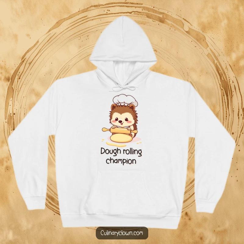 Funny Kawaii Hedgehog Chef Hoodie: A cute hedgehog chef diligently uses a miniature rolling pin on a patch of dough, looking concentrated.