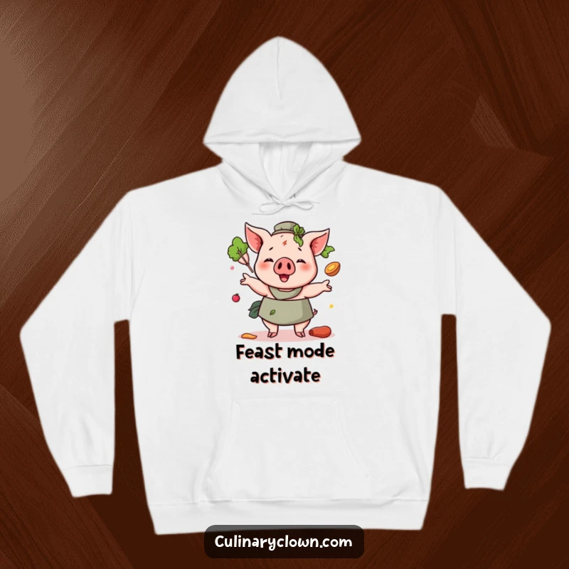 Funny Pig Chef Hoodie design with a cheerful pig character juggling various cooking ingredients with a smile, radiating kitchen fun.