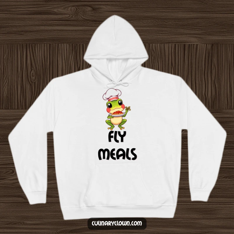 Funny chef frog presenting a well-garnished dish, featured on a comfortable and humorous hoodie.