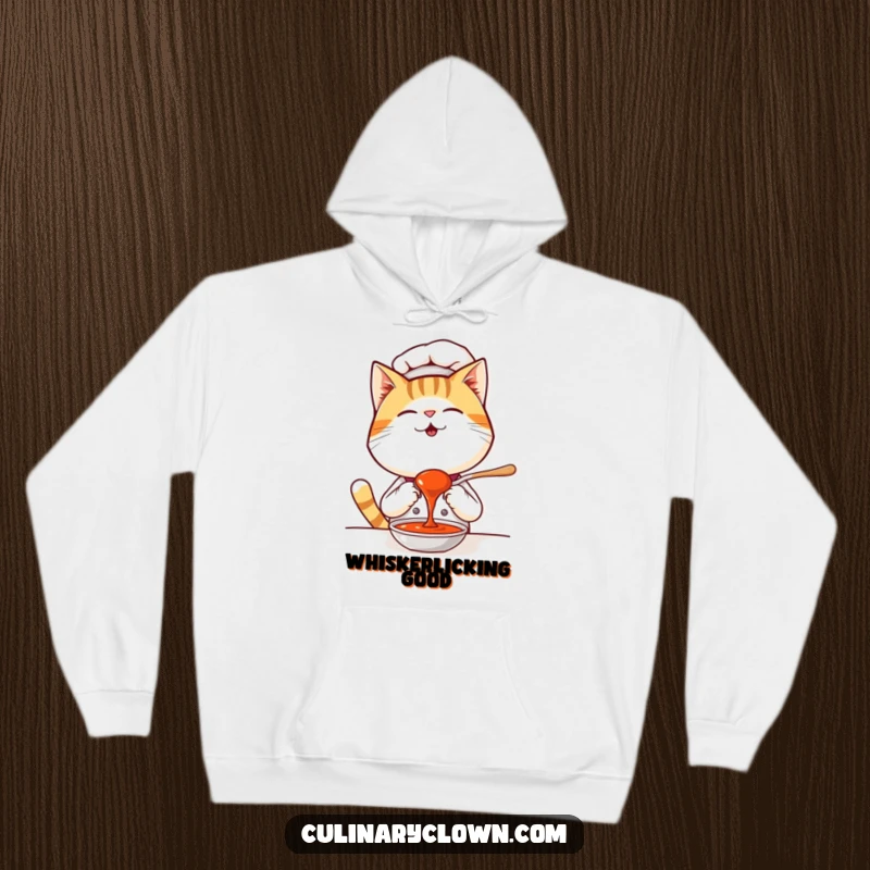 Funny Kawaii Cat Chef Hoodie: A cozy sweatshirt featuring a giggling cat chef tasting delicious sauce, bringing warmth and humor.