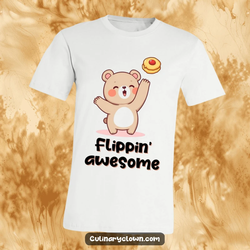 Funny t-shirt showing a cute bear character mid-air, excitedly flipping a pancake, spreading breakfast joy.