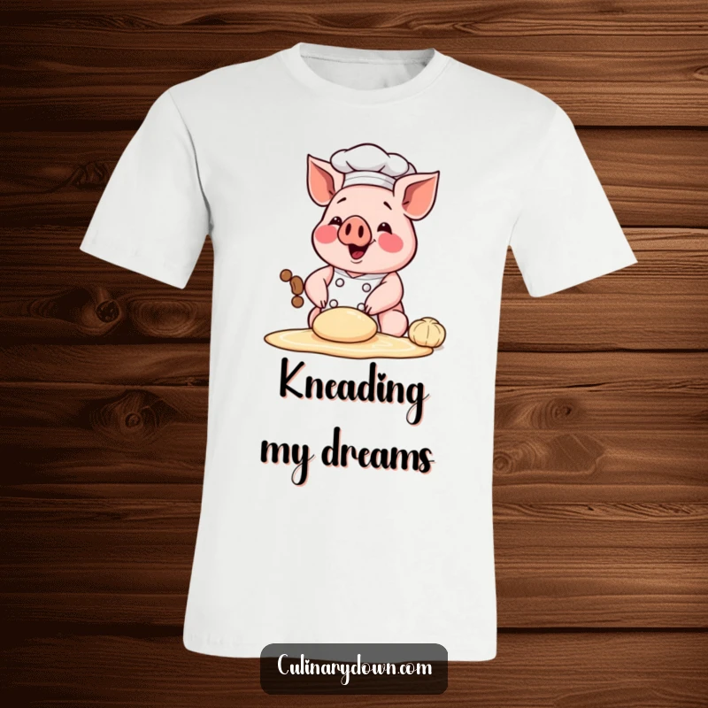 Funny t-shirt with a happy chef pig character joyfully kneading dough, perfect for bakers and food lovers.
