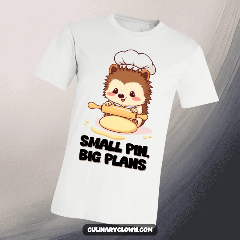 Funny Kawaii Hedgehog Chef T-Shirt: A cute hedgehog chef is meticulously using a tiny rolling pin on a piece of dough, looking very determined.
