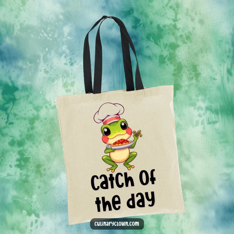 Funny chef frog presenting a dish on a stylish tote bag, a humorous and functional accessory.