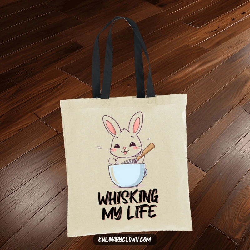 Funny tote bag depicting a smiling rabbit character whisking batter with a large spoon, great for grocery trips.